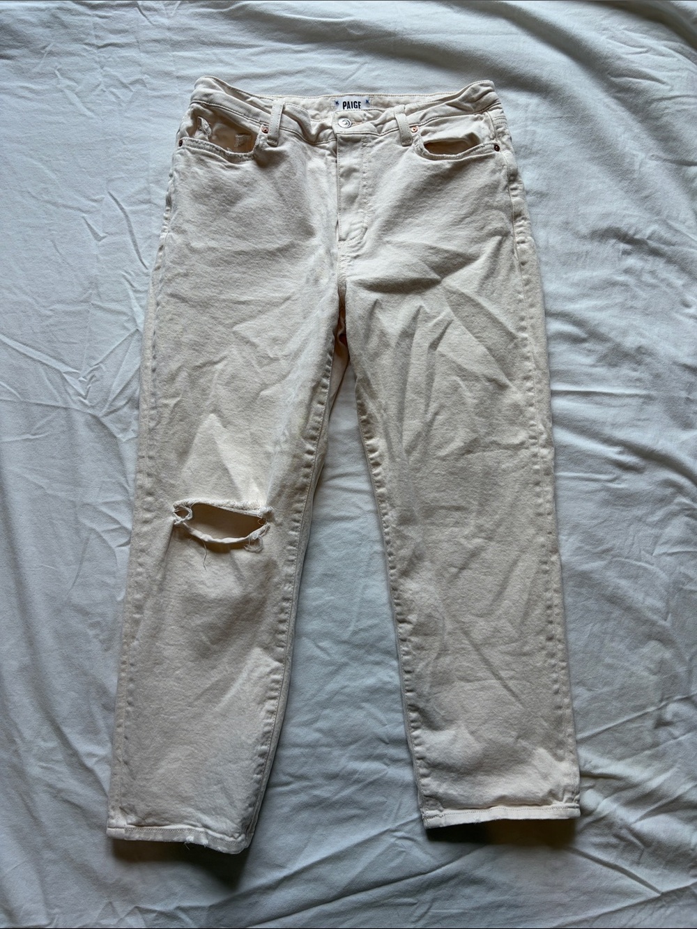 PAIGE Off-White Cropped Boyfriend Jeans with Knee Rip